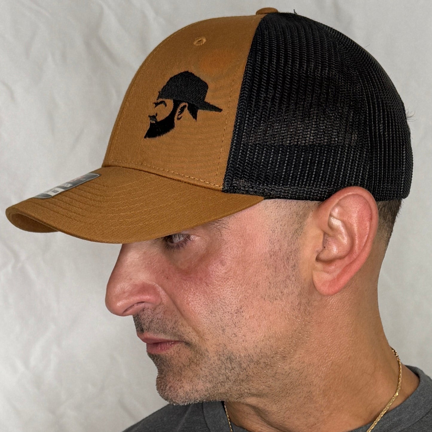 BROWN AND BLACK TRUCKER HAT